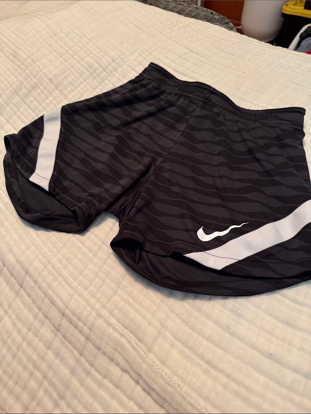 Nike Women’s Black Athletic Shorts with White Swoosh and Side Panels